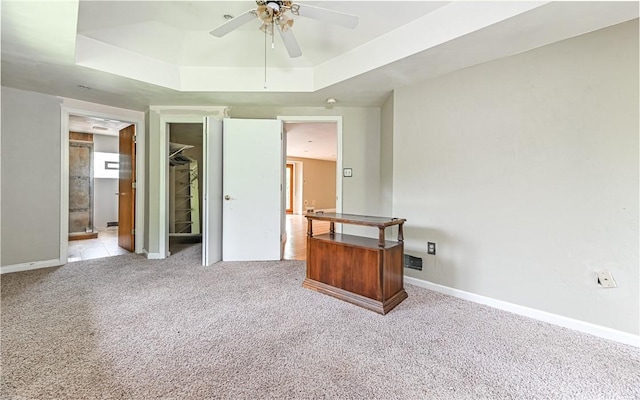 116 Parkfel Ave, Mccandless, PA 15237 - unfurnished bedroom with a raised ceiling, light colored carpet, and a ceiling fan