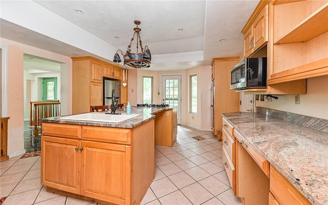 116 Parkfel Ave, Mccandless, PA 15237 - kitchen featuring appliances with stainless steel finishes, a center island, light tile patterned flooring, and a raised ceiling