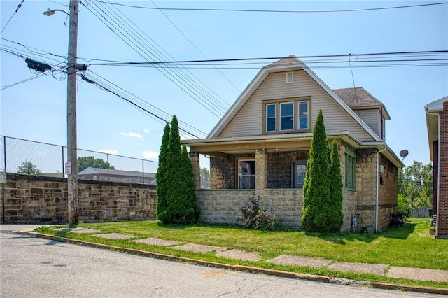 438 Miami St, East Mckeesport, PA 15035 - view of front of house featuring stone siding and a porch