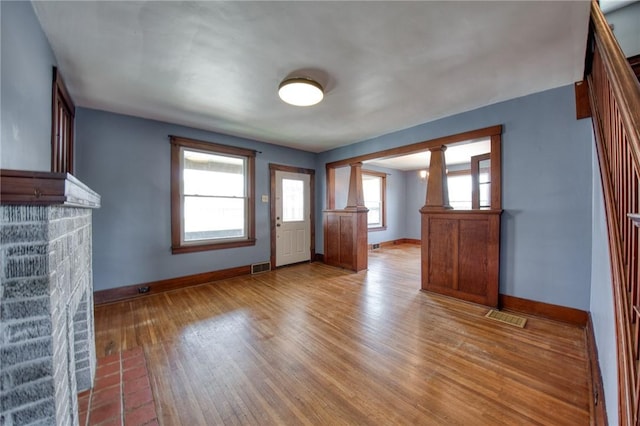 438 Miami St, East Mckeesport, PA 15035 - unfurnished living room with wood finished floors and baseboards