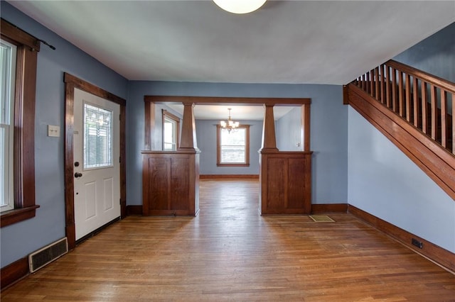 438 Miami St, East Mckeesport, PA 15035 - entrance foyer with a chandelier, light wood-style floors, and stairs