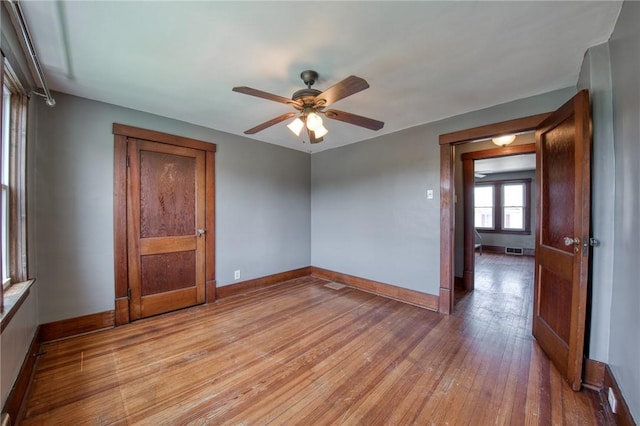 438 Miami St, East Mckeesport, PA 15035 - unfurnished room featuring light wood-style floors and a ceiling fan
