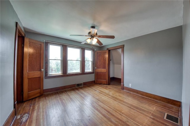 438 Miami St, East Mckeesport, PA 15035 - unfurnished bedroom featuring wood-type flooring and ceiling fan