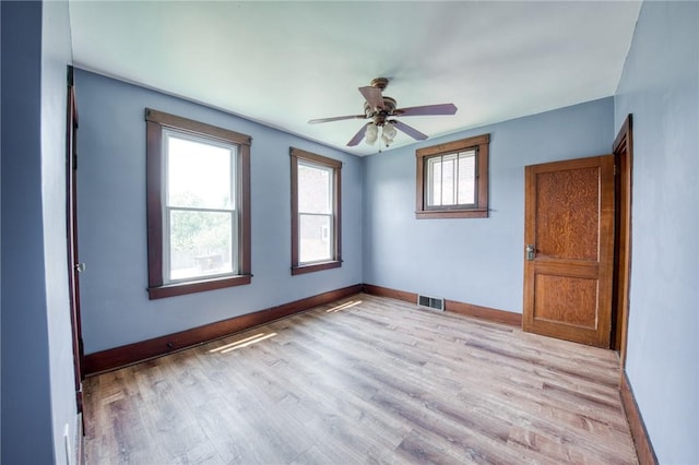 438 Miami St, East Mckeesport, PA 15035 - empty room featuring light wood finished floors and a ceiling fan