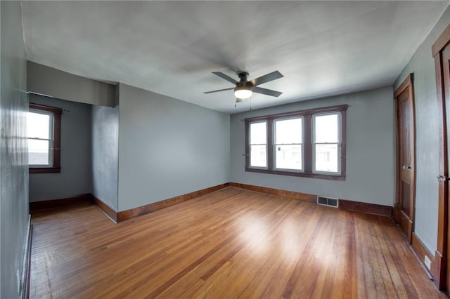 438 Miami St, East Mckeesport, PA 15035 - empty room featuring a ceiling fan and wood finished floors