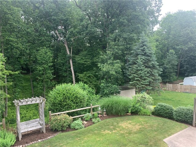 111 Brandywine Dr, Manor, PA 15642 - view of yard featuring a wooded view and a pergola
