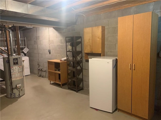 111 Brandywine Dr, Manor, PA 15642 - unfinished basement featuring refrigerator, water heater, and washer / clothes dryer