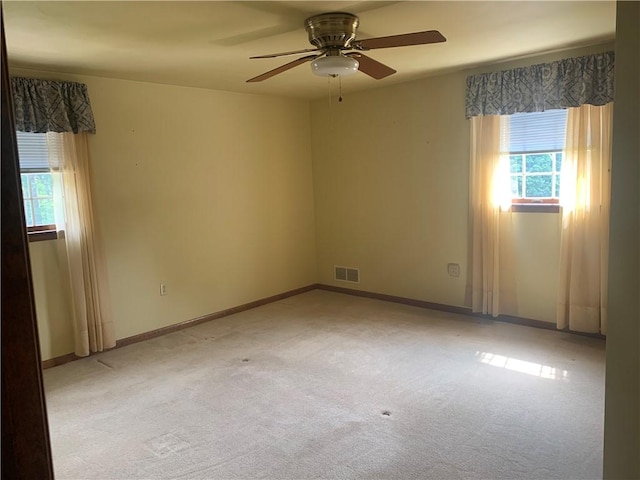 111 Brandywine Dr, Manor, PA 15642 - spare room with healthy amount of natural light, light colored carpet, and ceiling fan