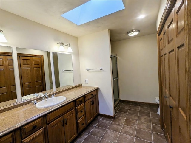 350 American Legion Rd, Unity Twp, PA 15650 - full bathroom featuring a skylight, vanity, a stall shower, tile patterned floors, and a closet