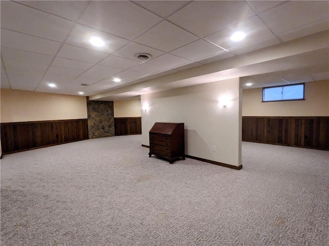 350 American Legion Rd, Unity Twp, PA 15650 - basement with wooden walls, carpet flooring, a wainscoted wall, and a paneled ceiling