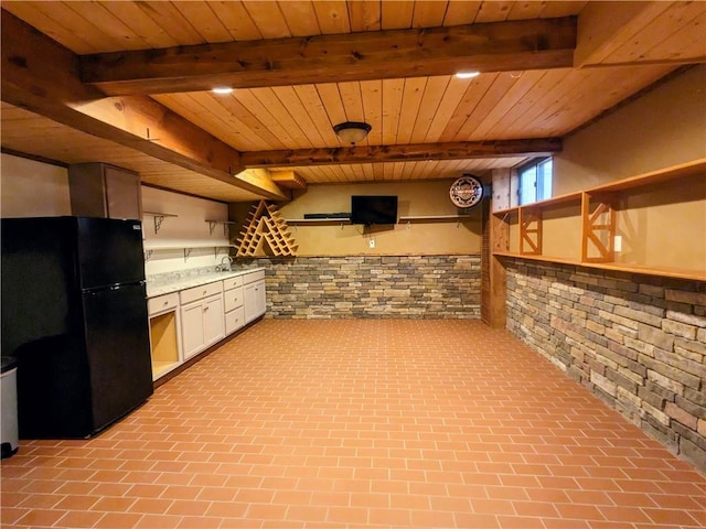 350 American Legion Rd, Unity Twp, PA 15650 - kitchen featuring freestanding refrigerator, open shelves, a wood ceiling with exposed beams, brick wall, and white cabinetry