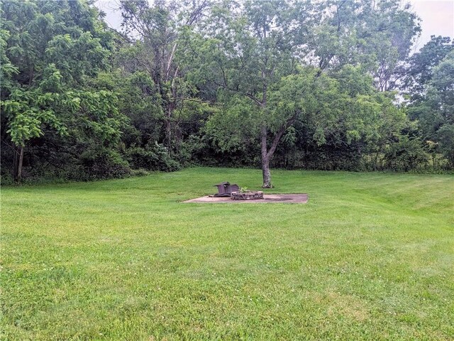 350 American Legion Rd, Unity Twp, PA 15650 - view of grassy yard with an outdoor fire pit