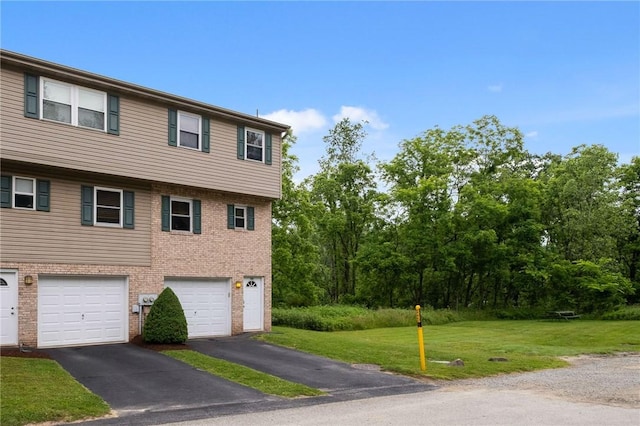 130 Pine Ct, Plum Boro, PA 15239 - view of property exterior with brick siding, a yard, driveway, and an attached garage