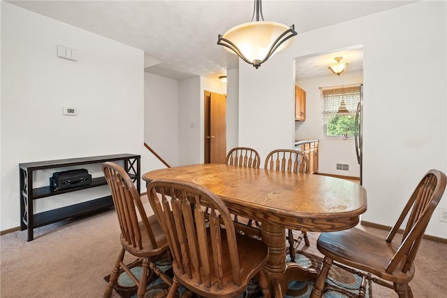 130 Pine Ct, Plum Boro, PA 15239 - dining room with light carpet and baseboards