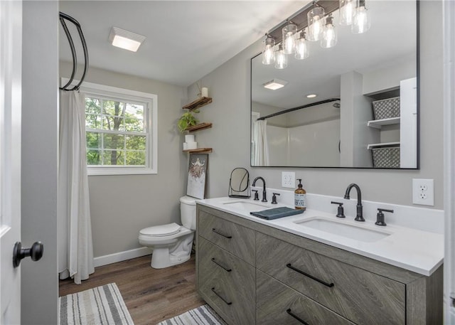 1415 Ashwood Cir, Upper St Clair, PA 15241 - full bath featuring double vanity, wood finished floors, and a shower with curtain