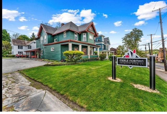 334 E State St, Sharon, PA 16146 - victorian-style house with a front yard