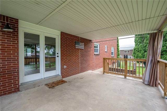 524 Saint Andrews Dr, Hempfield Twp Wml, PA 15601 - view of patio featuring an attached carport