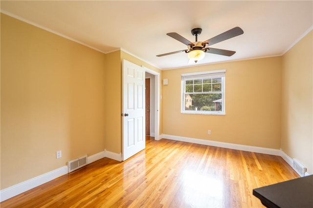 524 Saint Andrews Dr, Hempfield Twp Wml, PA 15601 - spare room with light wood finished floors, ornamental molding, and a ceiling fan