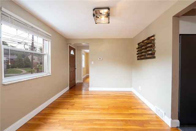 524 Saint Andrews Dr, Hempfield Twp Wml, PA 15601 - corridor featuring light wood-style floors and baseboards
