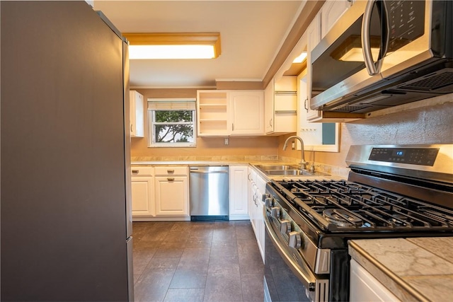 524 Saint Andrews Dr, Hempfield Twp Wml, PA 15601 - kitchen featuring appliances with stainless steel finishes, light countertops, and white cabinetry
