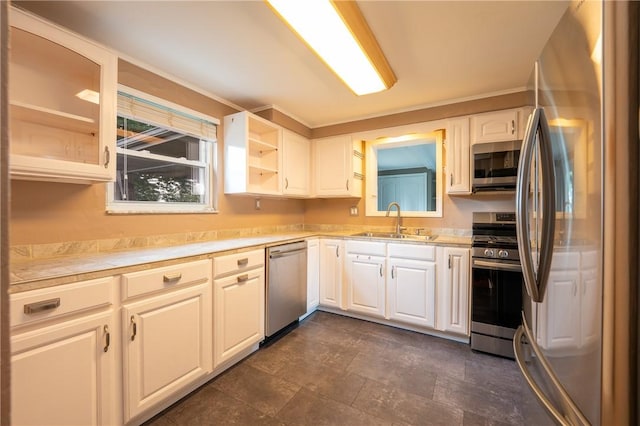 524 Saint Andrews Dr, Hempfield Twp Wml, PA 15601 - kitchen with stainless steel appliances, light countertops, white cabinets, and glass insert cabinets