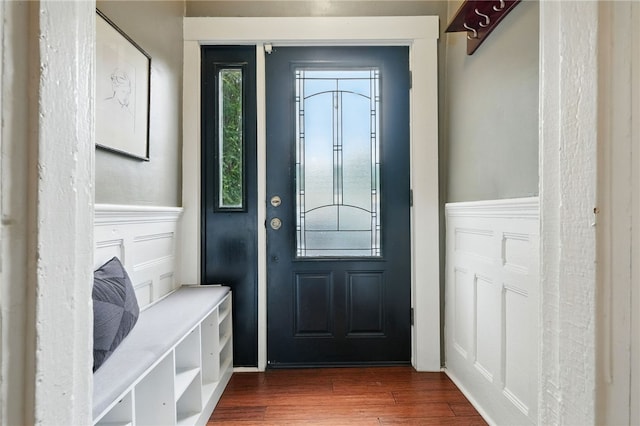 2315 Jane St, South Side, PA 15203 - entrance foyer featuring a wainscoted wall, dark wood-style floors, and a decorative wall