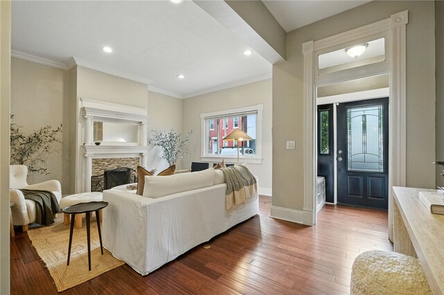 2315 Jane St, South Side, PA 15203 - living area featuring crown molding, recessed lighting, wood-type flooring, and a fireplace