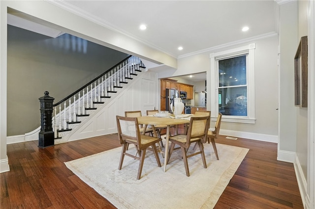 2315 Jane St, South Side, PA 15203 - dining area featuring stairs, dark wood-style floors, crown molding, and recessed lighting