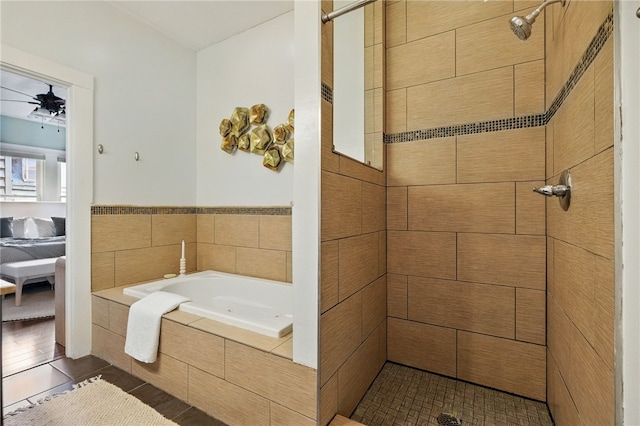 2315 Jane St, South Side, PA 15203 - full bathroom with a garden tub, tile patterned flooring, a tile shower, and a ceiling fan