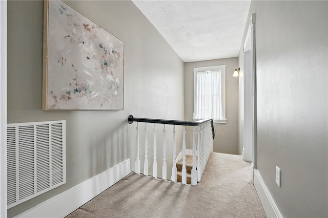 2315 Jane St, South Side, PA 15203 - hall with carpet flooring and an upstairs landing