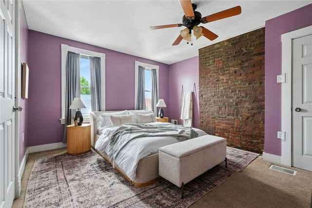 2315 Jane St, South Side, PA 15203 - bedroom featuring carpet flooring, ceiling fan, and brick wall