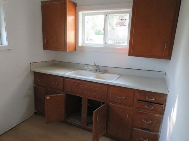 1250 Summerlea Ave, City Of Washington, PA 15301 - kitchen featuring brown cabinetry and light countertops