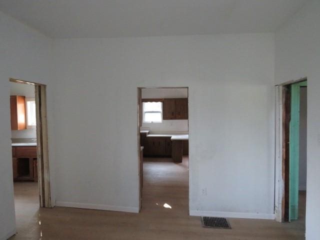 1250 Summerlea Ave, City Of Washington, PA 15301 - empty room with baseboards and light wood finished floors