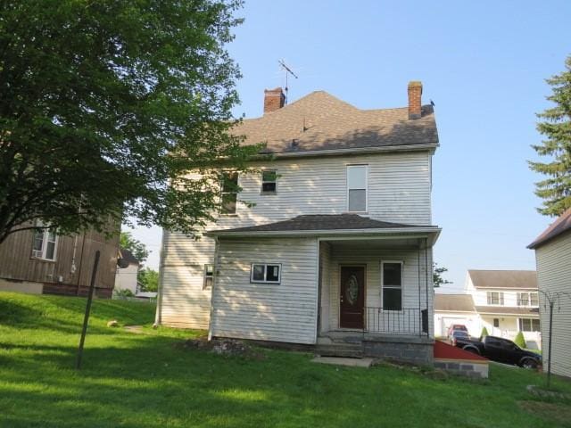 1250 Summerlea Ave, City Of Washington, PA 15301 - rear view of house featuring a lawn