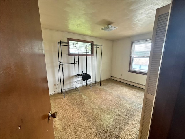 105 Fern Way, Glassport, PA 15045 - empty room featuring a baseboard radiator and carpet