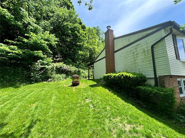 105 Fern Way, Glassport, PA 15045 - view of grassy yard with a fire pit