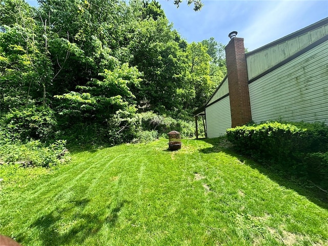105 Fern Way, Glassport, PA 15045 - view of grassy yard featuring a fire pit