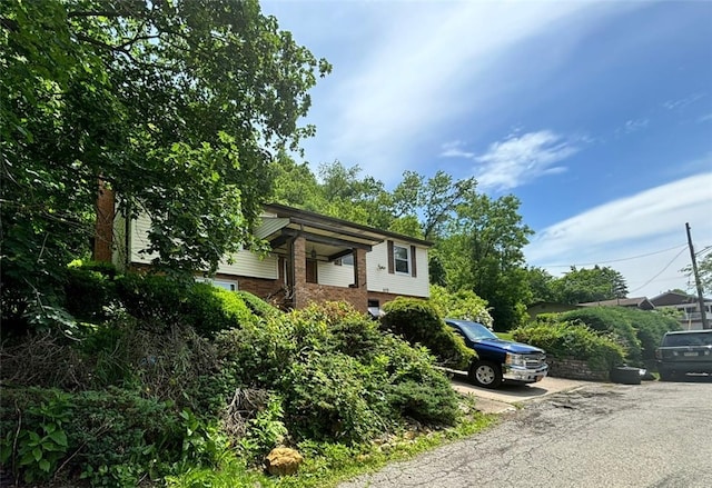 105 Fern Way, Glassport, PA 15045 - view of front of house featuring brick siding and driveway