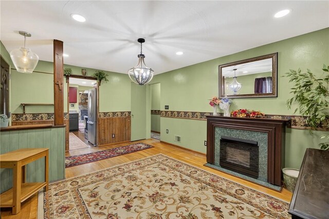 914 E Smithfield St, Elizabeth Twp/Boro, PA 15135 - living room featuring light wood-style floors, recessed lighting, and a fireplace