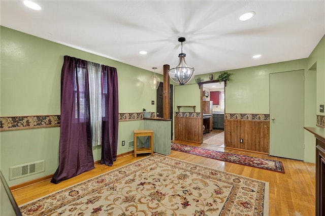 914 E Smithfield St, Elizabeth Twp/Boro, PA 15135 - dining space with wainscoting, wood finished floors, and recessed lighting