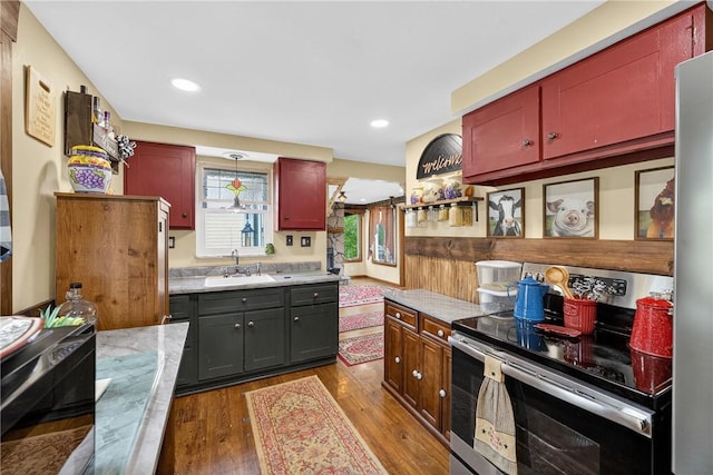 914 E Smithfield St, Elizabeth Twp/Boro, PA 15135 - kitchen featuring stainless steel appliances, dark wood finished floors, light countertops, pendant lighting, and recessed lighting
