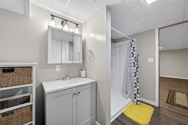 914 E Smithfield St, Elizabeth Twp/Boro, PA 15135 - bathroom with a drop ceiling, wood finished floors, a shower stall, and vanity