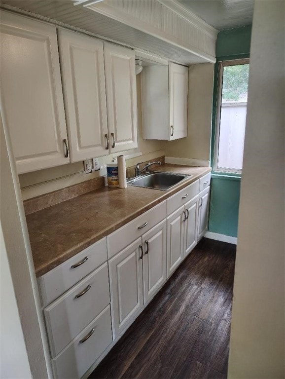 526 Pennwood Dr, Penn Hills, PA 15235 - kitchen with dark wood-style flooring and white cabinets