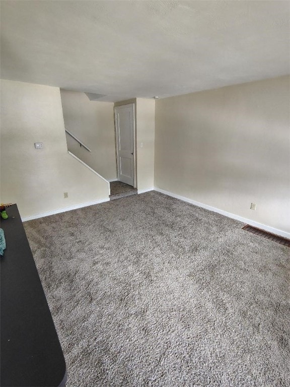 526 Pennwood Dr, Penn Hills, PA 15235 - unfurnished living room featuring carpet floors and baseboards
