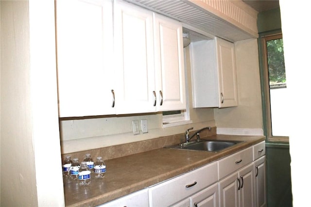 526 Pennwood Dr, Penn Hills, PA 15235 - kitchen with a sink and white cabinetry
