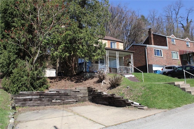 526 Pennwood Dr, Penn Hills, PA 15235 - view of front facade with covered porch and a front yard