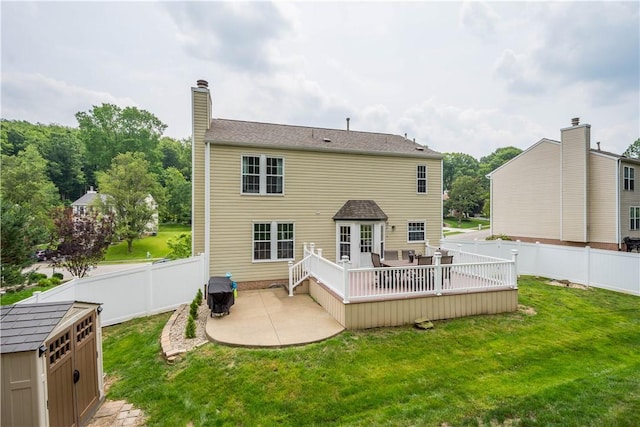 317 Shady Glen Dr, Moon/Crescent Twp, PA 15108 - back of house with a patio area, a wooden deck, a fenced backyard, and a chimney
