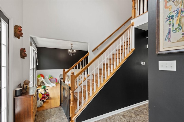 317 Shady Glen Dr, Moon/Crescent Twp, PA 15108 - stairs featuring a chandelier
