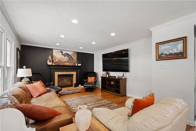 317 Shady Glen Dr, Moon/Crescent Twp, PA 15108 - living area with recessed lighting, wood finished floors, a fireplace, and ornamental molding