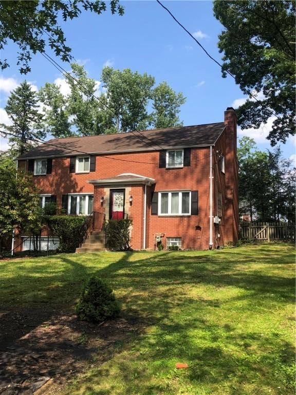 1850 Graham Blvd, Wilkinsburg, PA 15235 - view of front of property with a chimney and brick siding